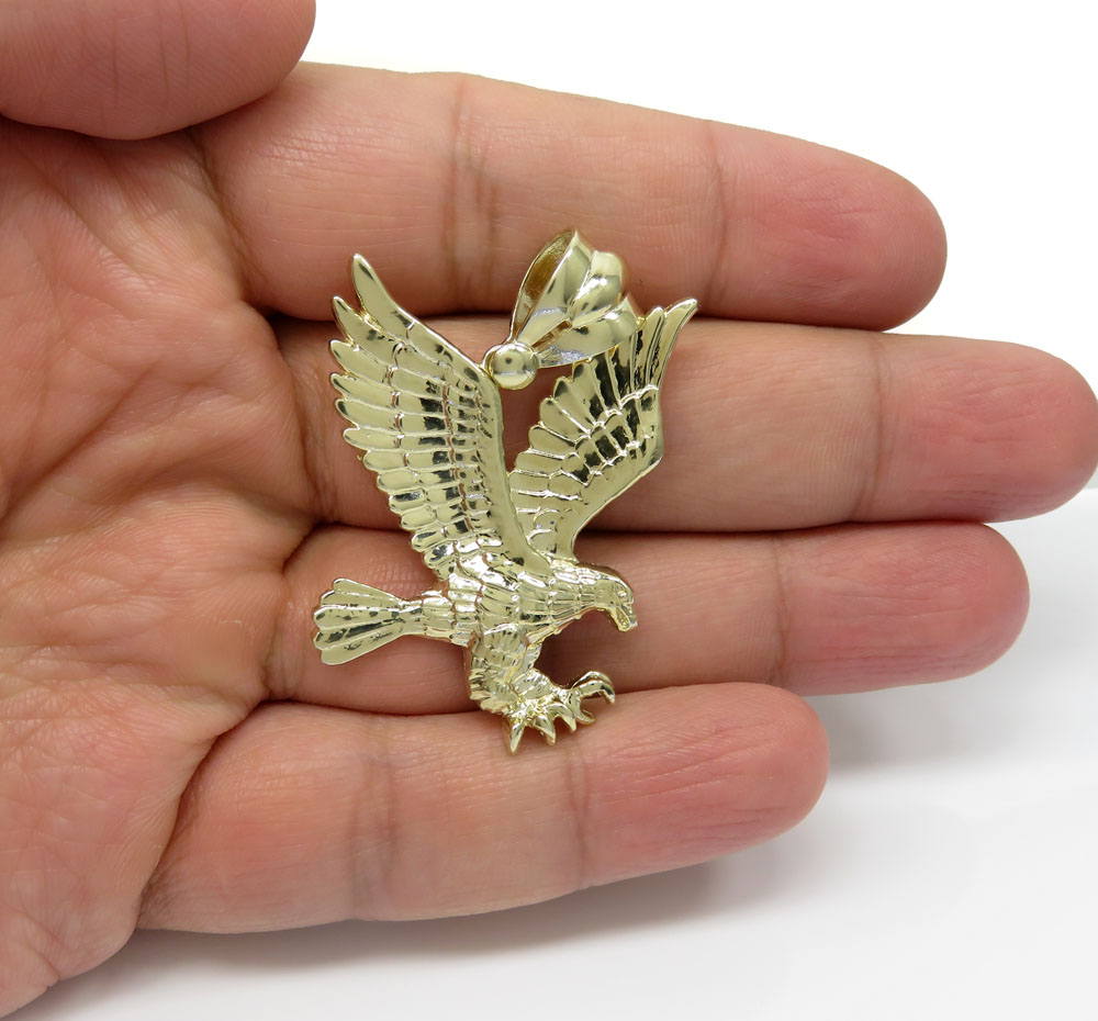 14k yellow gold medium diamond cut flying eagle pendant