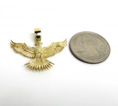 14k yellow gold small solid flying eagle pendant