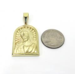10k yellow gold matte cathedral jesus pendant 