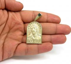10k yellow gold matte cathedral jesus pendant 