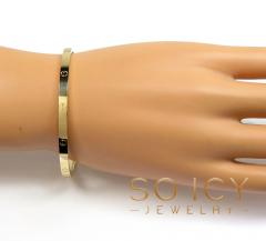 18k solid gold skinny screw bangle 