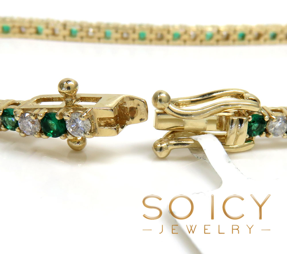 14k yellow gold round 4 pointer diamond & emerald tennis bracelet 7.25