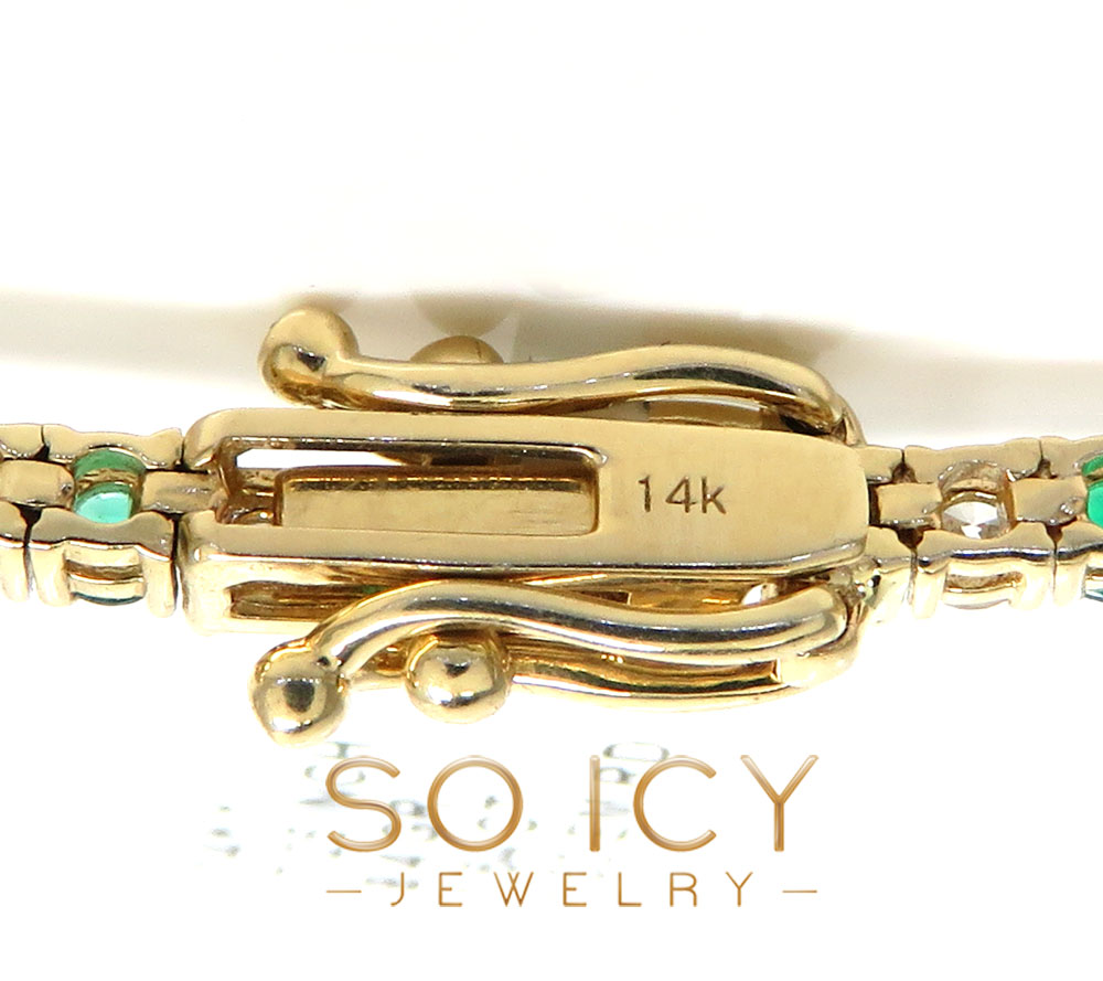 14k yellow gold round 4 pointer diamond & emerald tennis bracelet 7.25