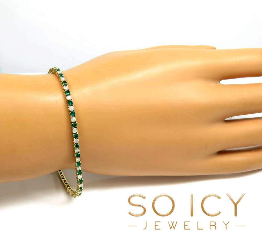 14k yellow gold round 4 pointer diamond & emerald tennis bracelet 7.25