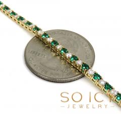 14k yellow gold round 4 pointer diamond & emerald tennis bracelet 7.25