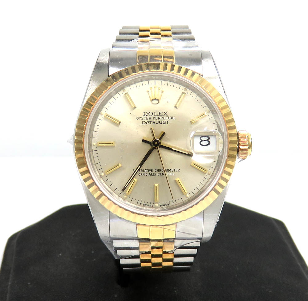 Rolex datejust 31mm 18k yellow gold and stainless steel champagne dial watch ref.  68273 