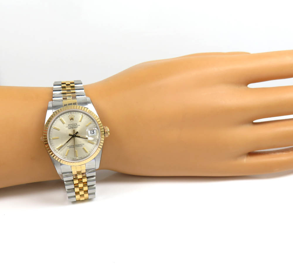 Rolex datejust 31mm 18k yellow gold and stainless steel champagne dial watch ref.  68273 
