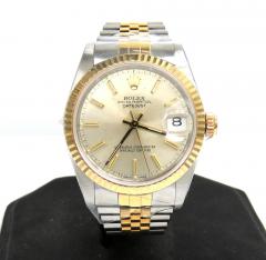 Rolex datejust 31mm 18k yellow gold and stainless steel champagne dial watch ref.  68273 