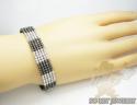 Ladies 14k black & white gold fancy bangle bracelet