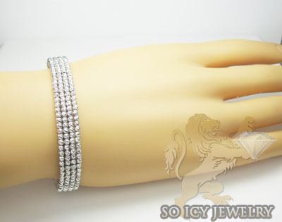 Ladies 14k black & white gold fancy 4 row bangle bracelet