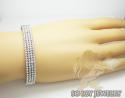 Ladies 14k black & white gold fancy 4 row bangle bracelet