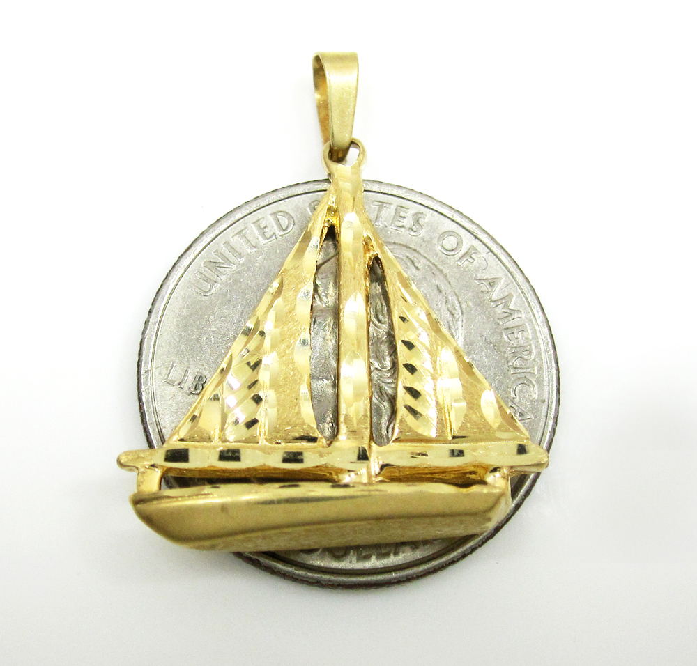 14 karat gold sailboat pendant