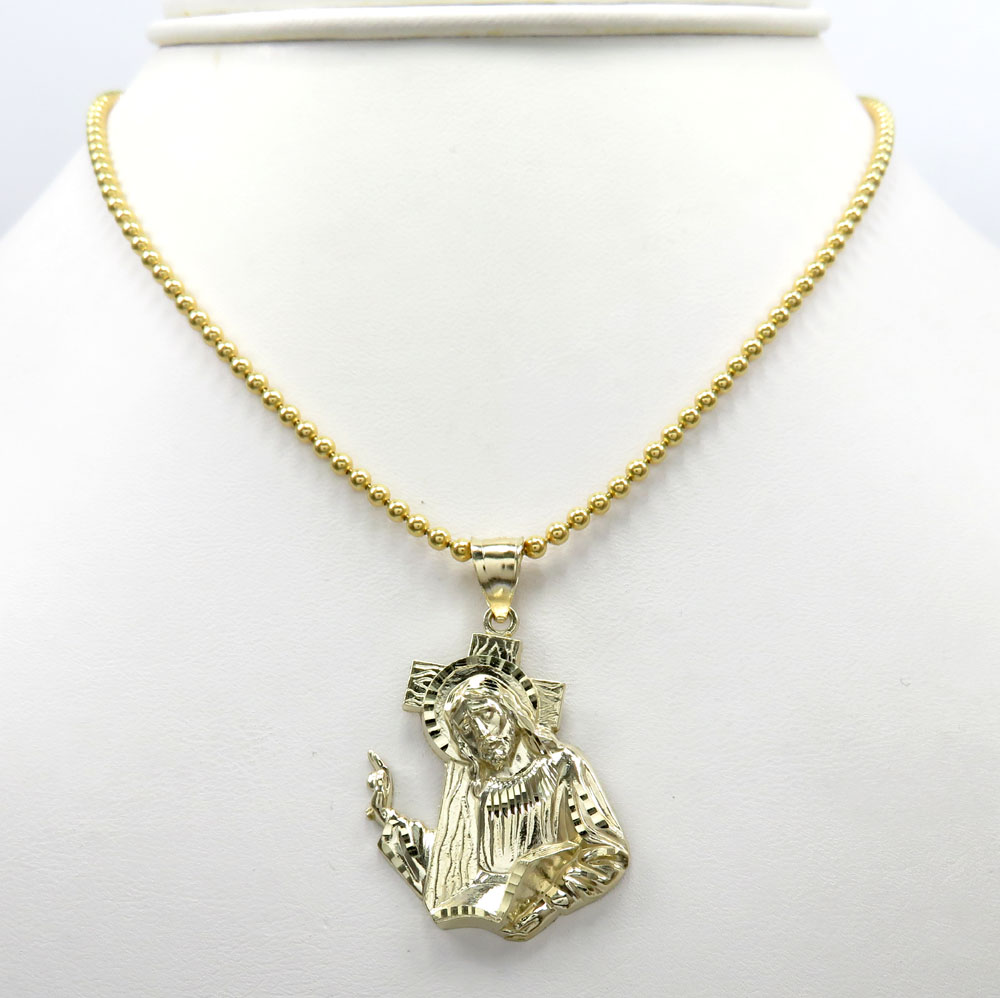 10k yellow gold jesus carrying cross medium pendant