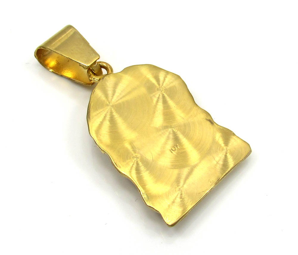 10k yellow gold mini jesus face solid back  pendant .28ct