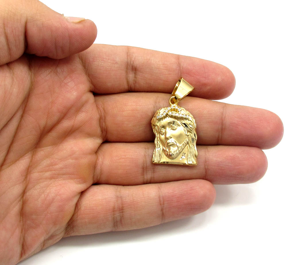10k yellow gold mini jesus face solid back  pendant .28ct