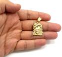 10k yellow gold mini jesus face solid back  pendant .28ct