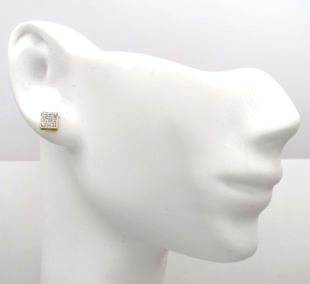 10k gold 3 row diamond earrings  0.07ct