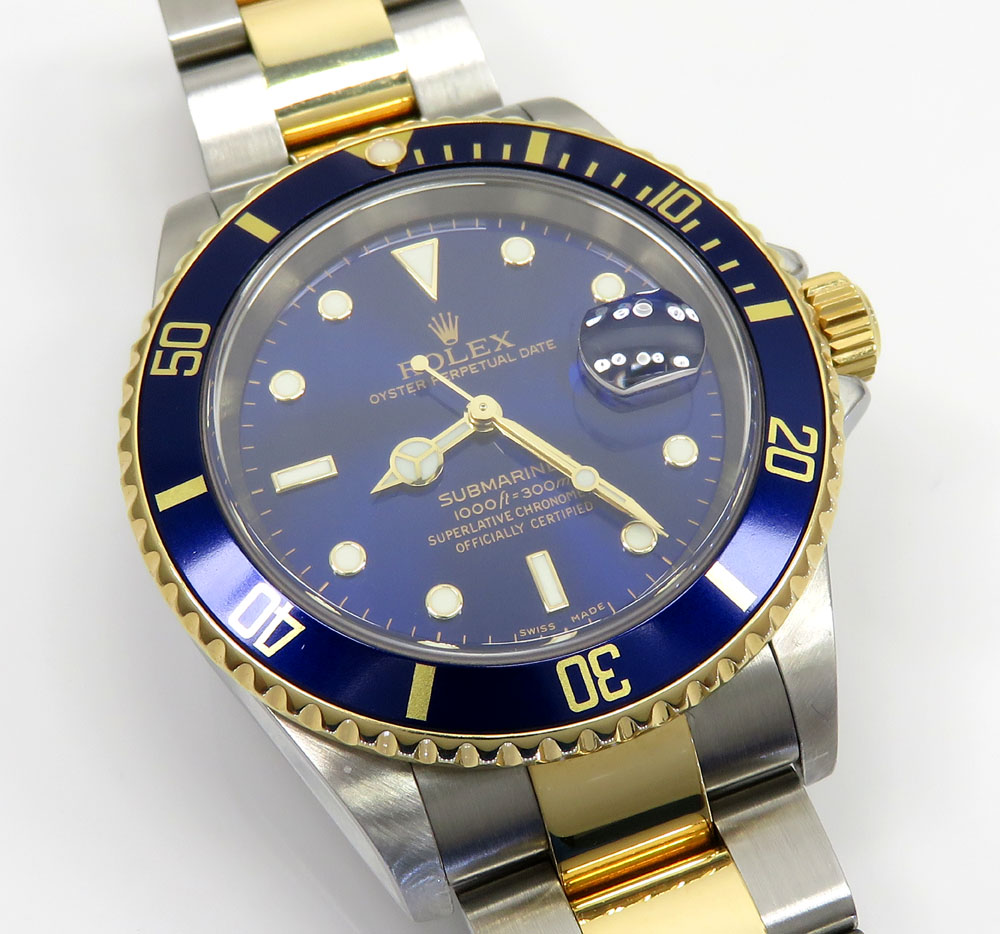18k yellow gold and stainless steel mens rolex 40mm submariner watch 