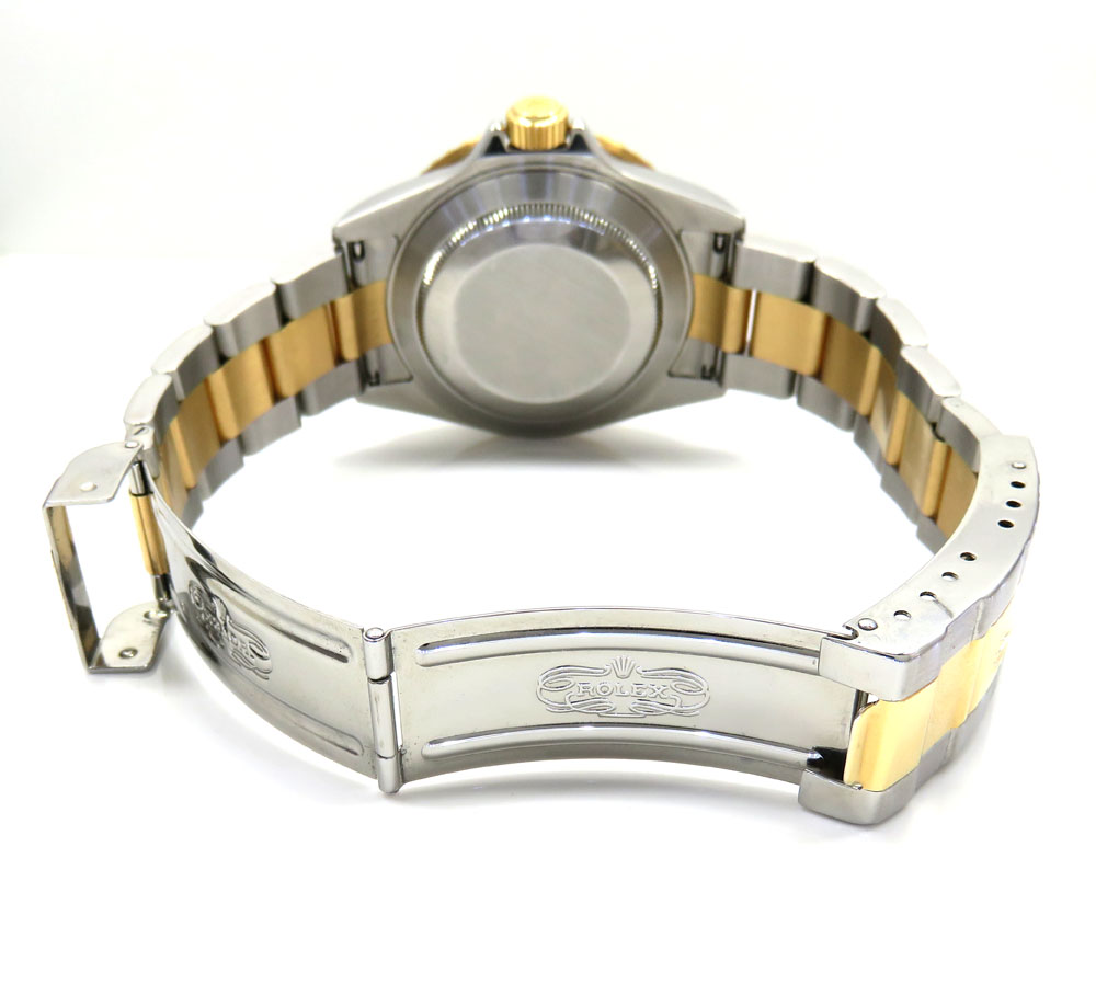18k yellow gold and stainless steel mens rolex 40mm submariner watch 