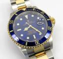 18k yellow gold and stainless steel mens rolex 40mm submariner watch 