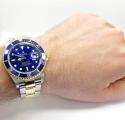 18k yellow gold and stainless steel mens rolex 40mm submariner watch 
