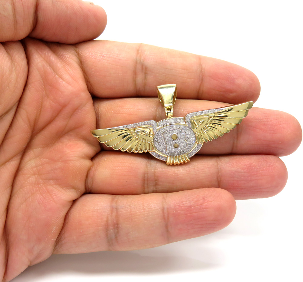 14k yellow gold diamond flying b wing pendant 0.61ct