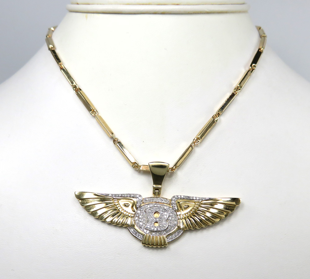 14k yellow gold diamond flying b wing pendant 0.61ct