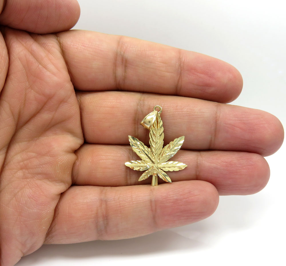 14k yellow gold small marijuana leaf pendant