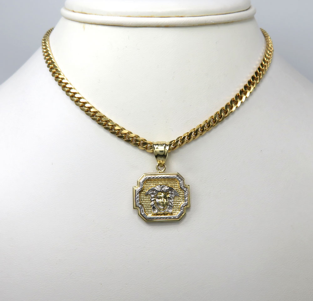 10k yellow gold boxed halo medusa head pendant 
