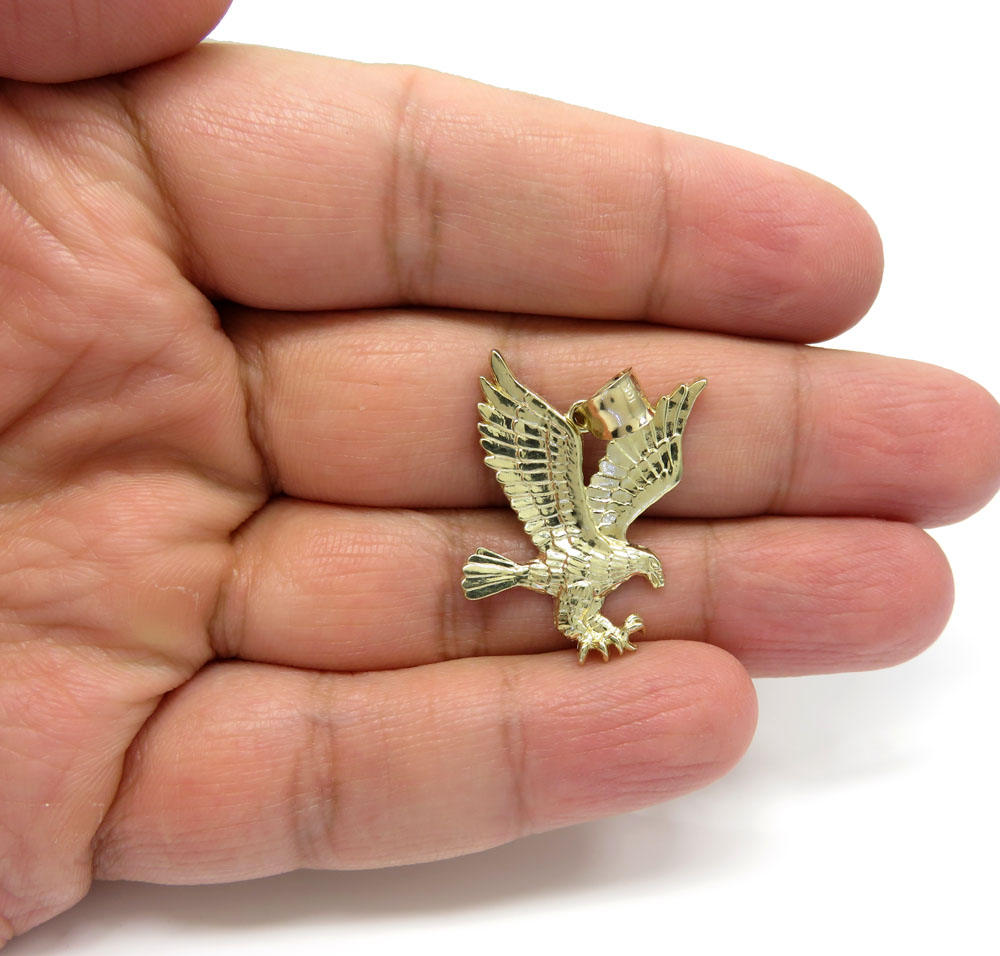 10k yellow gold small diamond cut flying eagle pendant