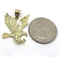 10k yellow gold small diamond cut flying eagle pendant