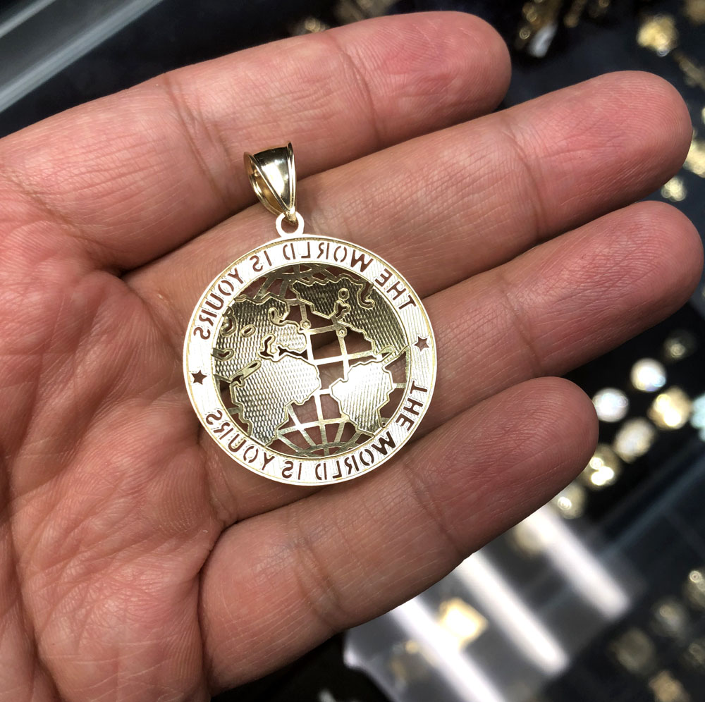 10k yellow gold large the world is yours pendant 