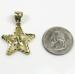 14k yellow gold diamond cut star pendant