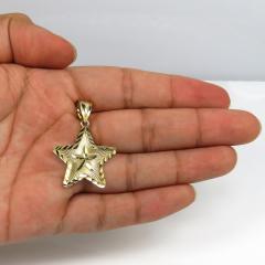 14k yellow gold diamond cut star pendant
