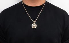 14k yellow gold the world is yours spinning globe standard pendant