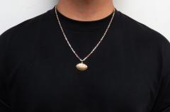 14k yellow gold small foot ball pendant 