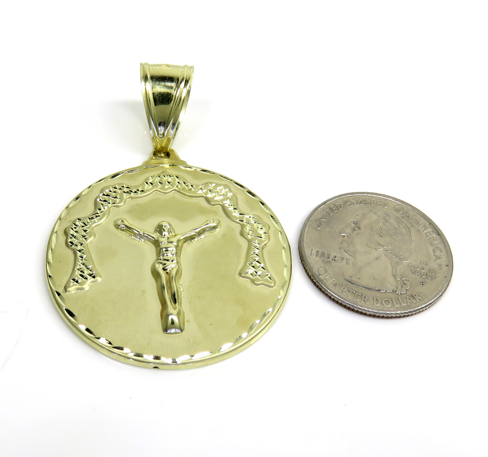 10k yellow gold diamond cut medium hanging jesus pendant 