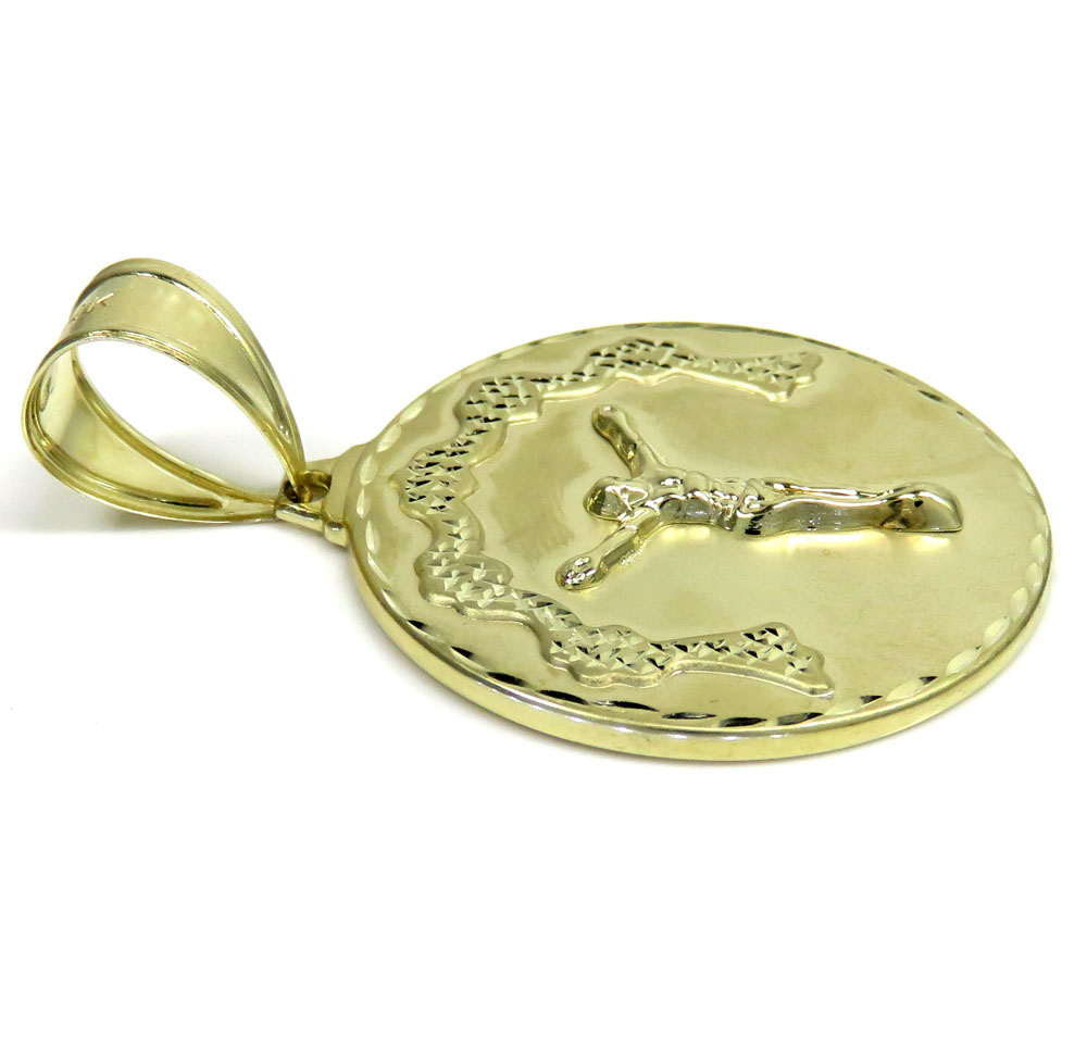 10k yellow gold diamond cut medium hanging jesus pendant 