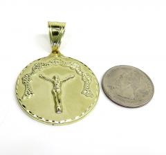 10k yellow gold diamond cut medium hanging jesus pendant 