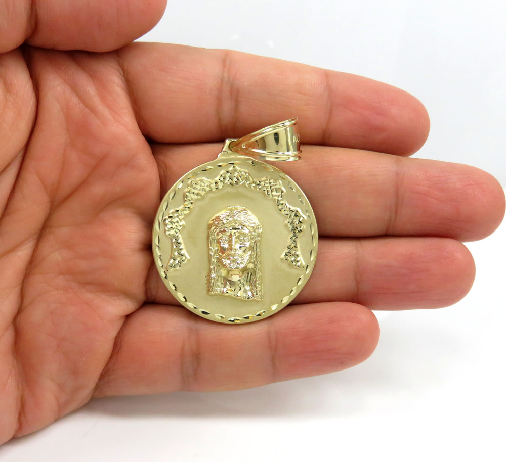 10k yellow gold diamond cut medium jesus face pendant 