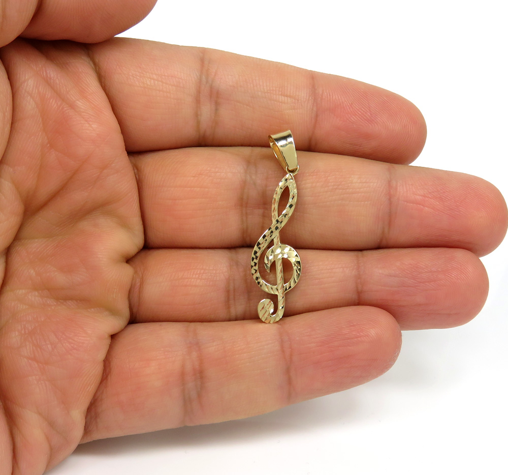 14k gold diamond cut music note pendant 