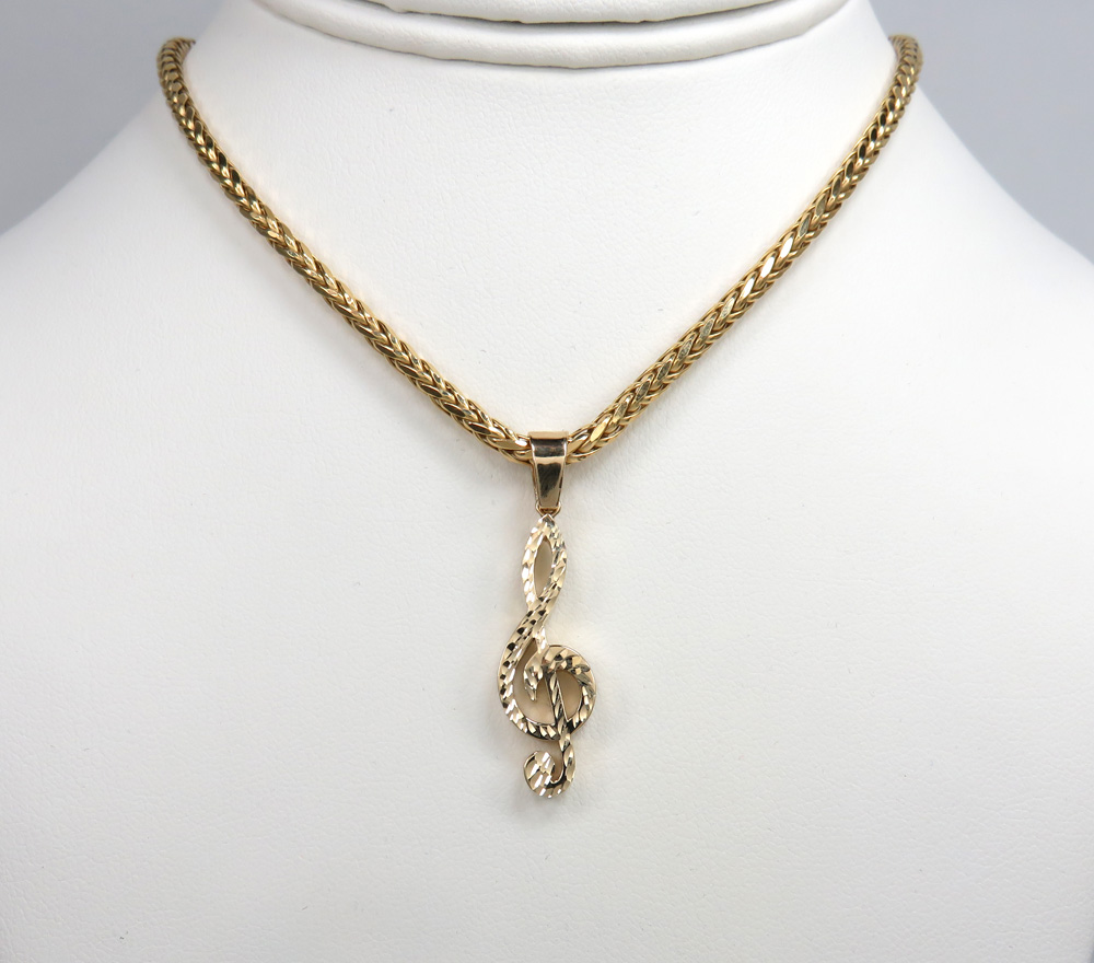 14k gold diamond cut music note pendant 