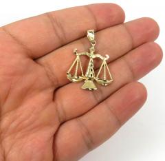 14k yellow gold small diamond cut libra scale pendant 