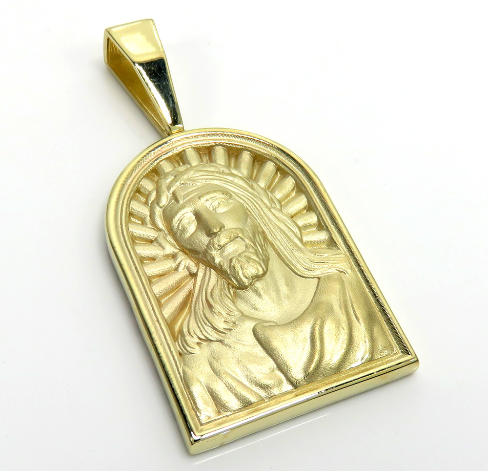 10k yellow gold matte cathedral jesus pendant 