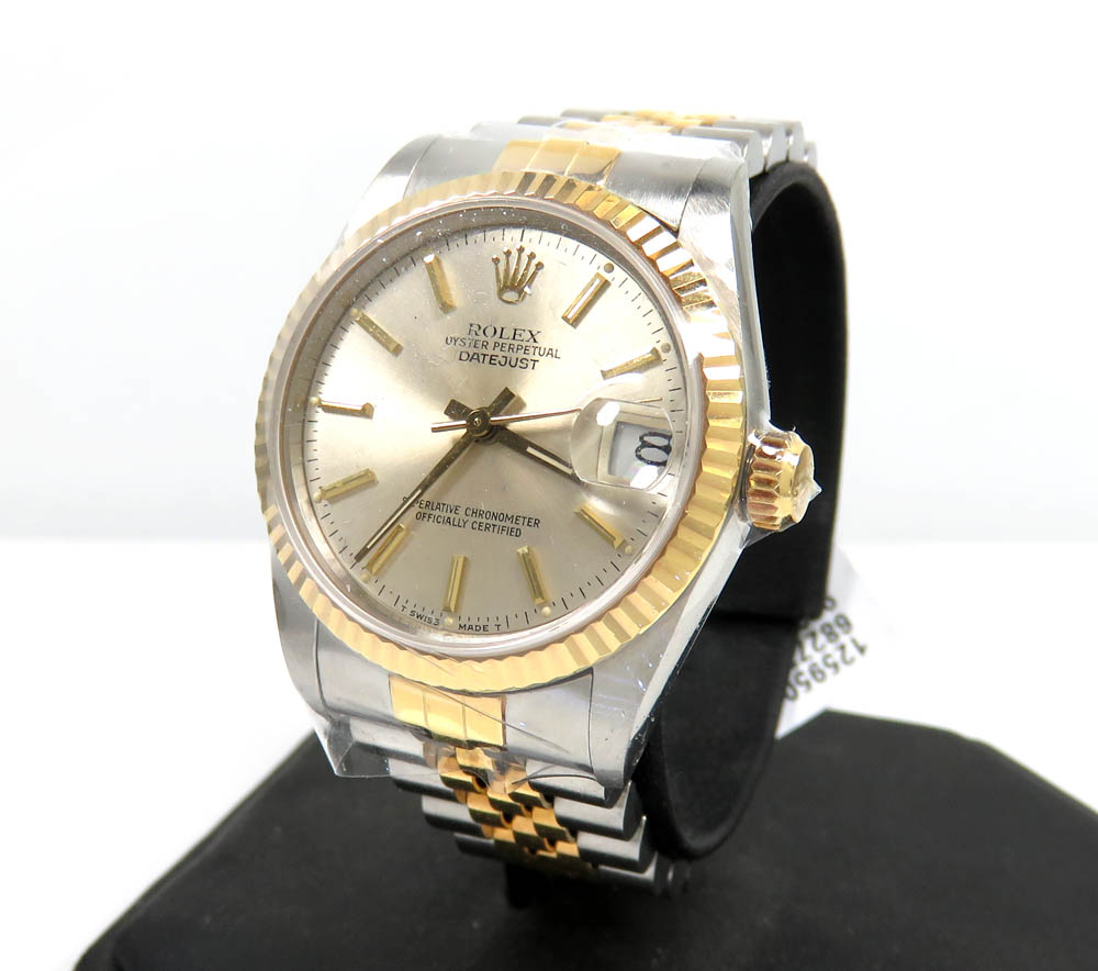 Rolex datejust 31mm 18k yellow gold and stainless steel champagne dial watch ref.  68273