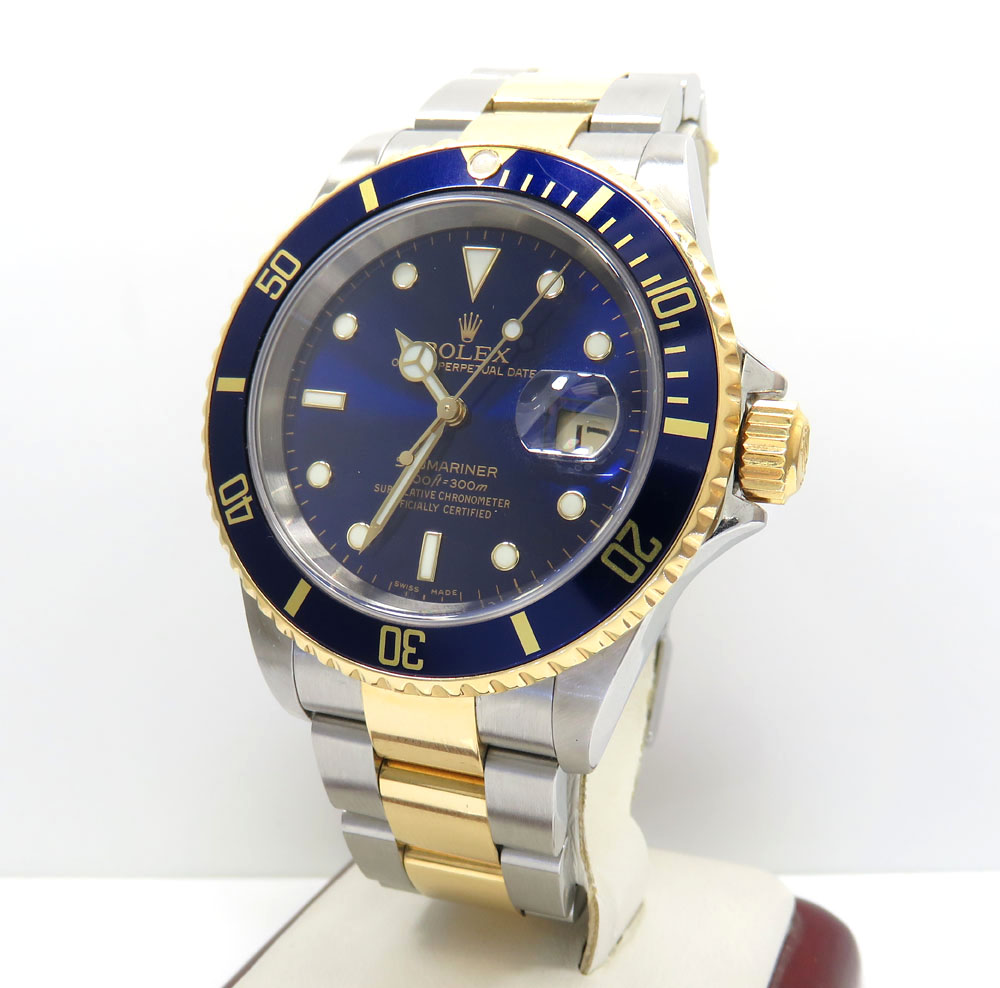 18k yellow gold and stainless steel mens rolex 40mm submariner watch 