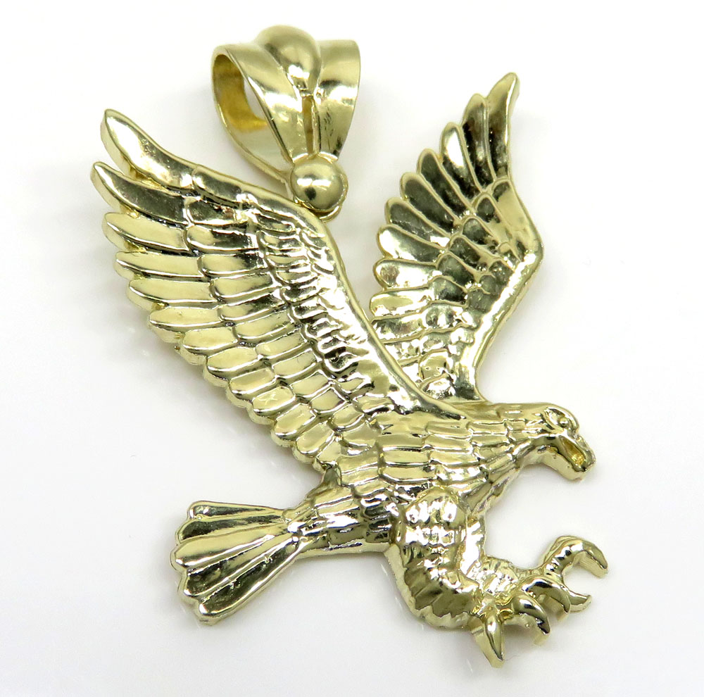 10k yellow gold medium diamond cut flying eagle pendant