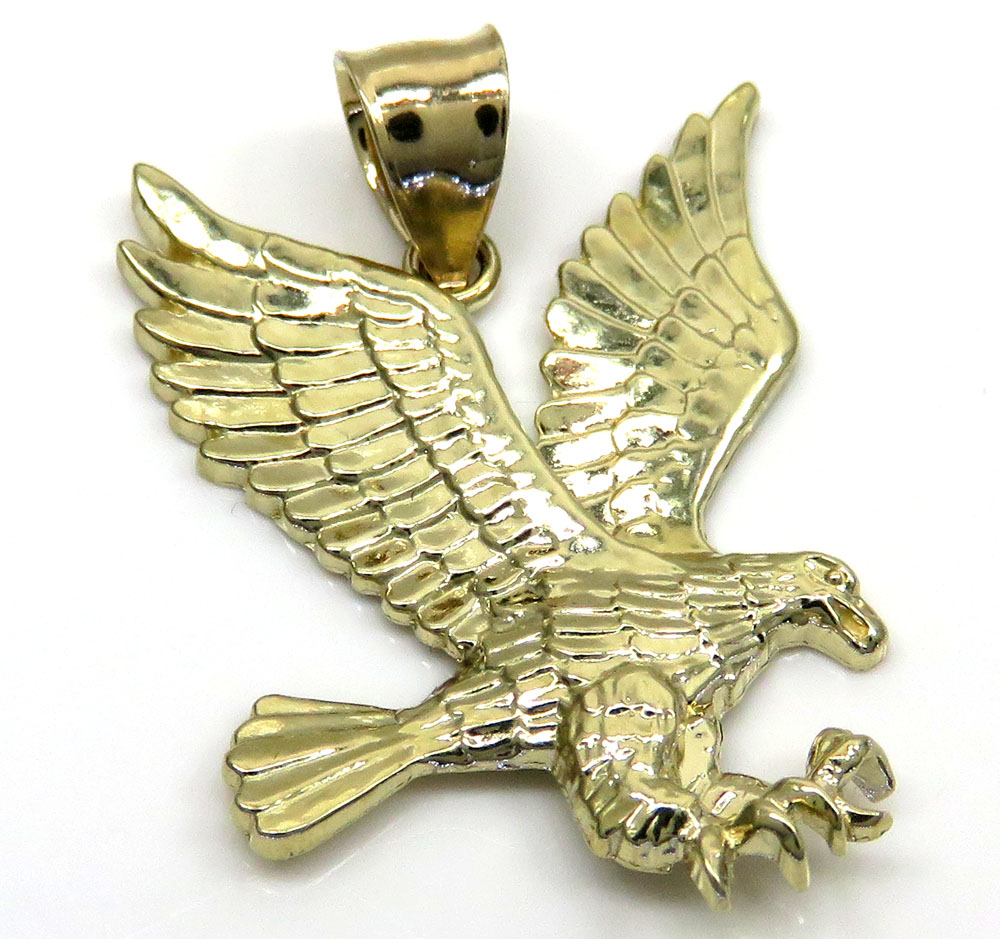 10k yellow gold small diamond cut flying eagle pendant