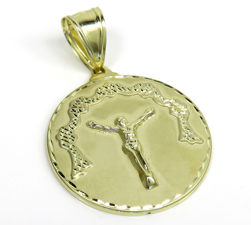 10k yellow gold diamond cut medium hanging jesus pendant 